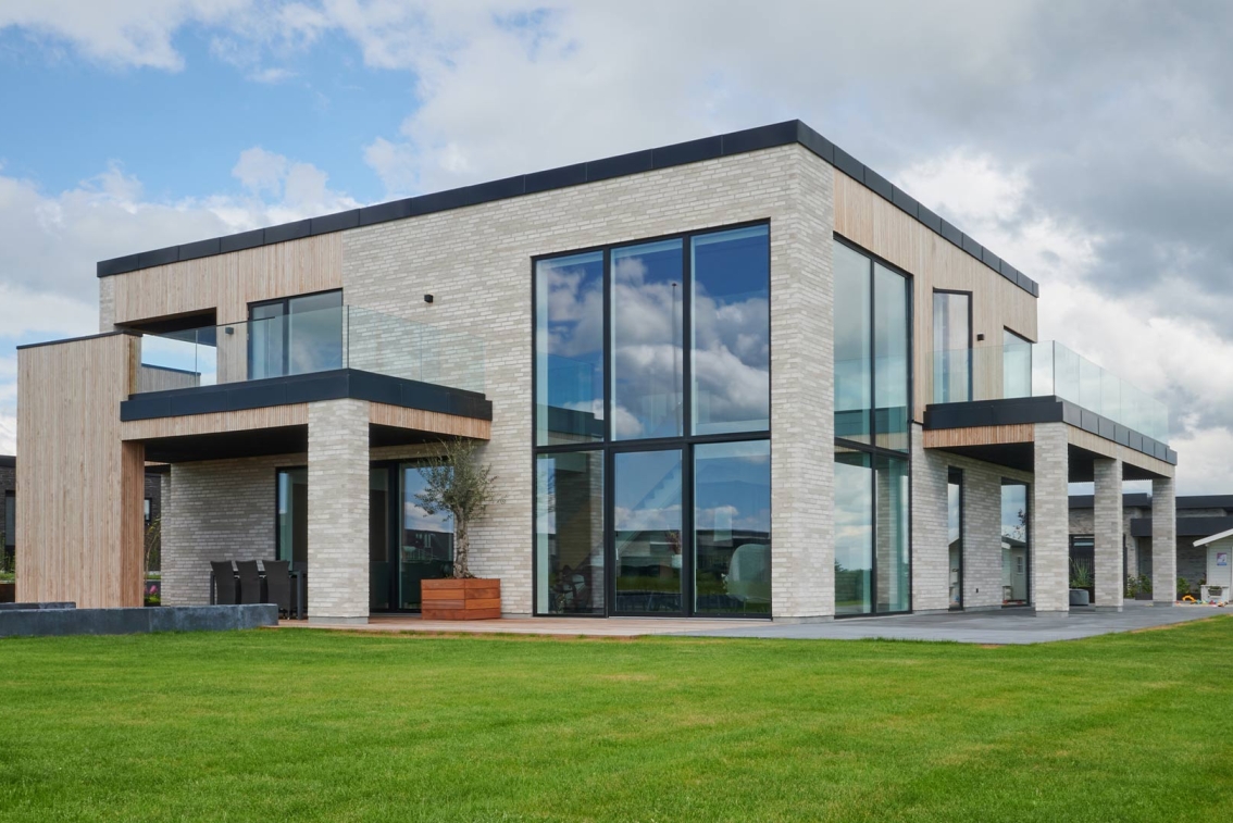 Villa med facadelister i 
Thermo-D Fyr Premium.