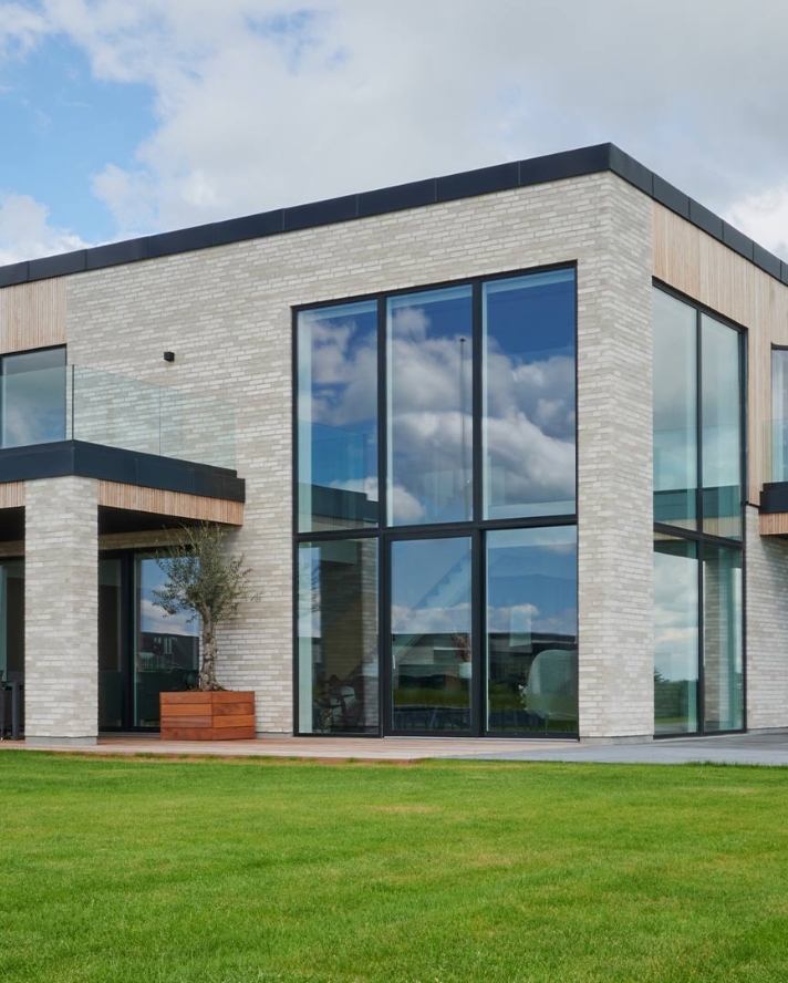 Villa med facadelister i 
Thermo-D Fyr Premium.