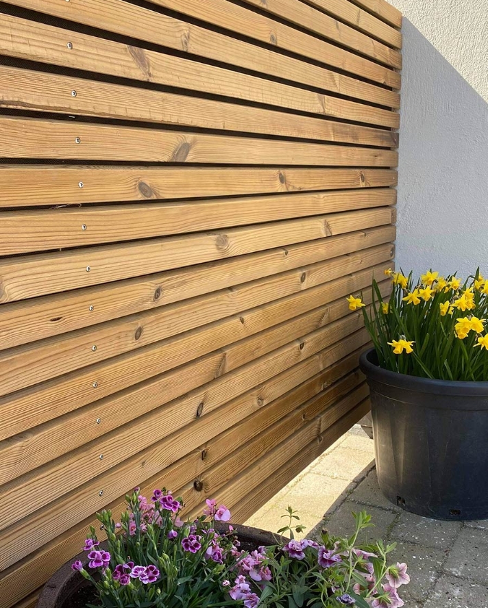 Læhegn med 
Thermo Fyr 
facadelister.