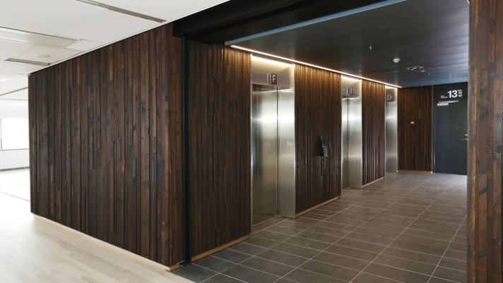 Genbrugt træ er med til at skabe eksklusive interiørløsninger ved Copenhagen Towers midt i det pulserende København..