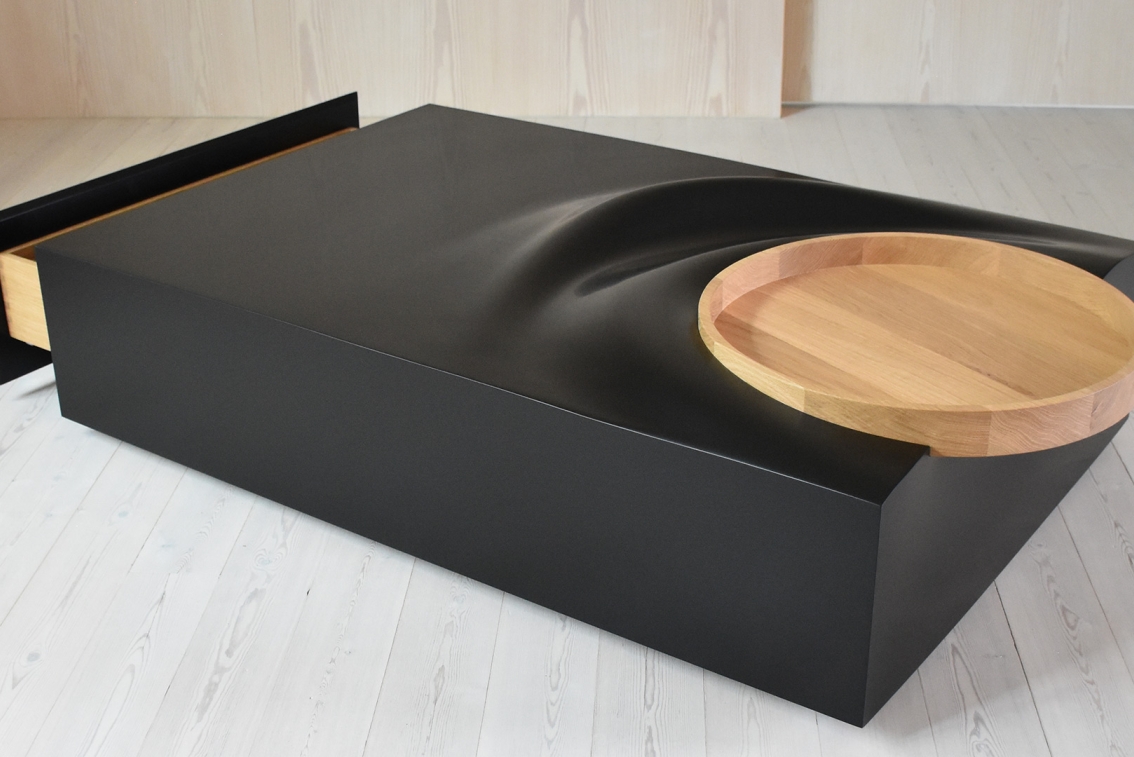 Sofabord med
detaljer i Eg.