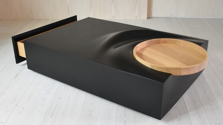 Sofabord med
detaljer i Eg.